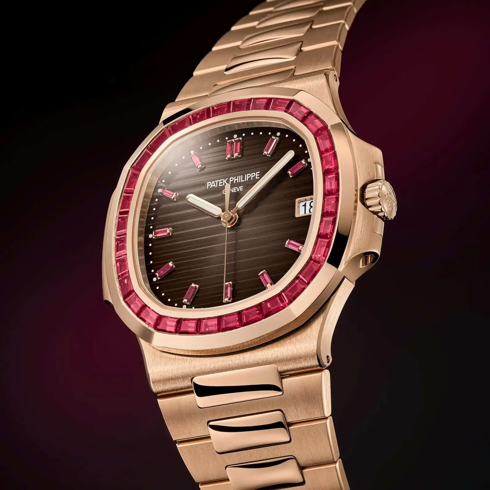 Patek Philippe Nautilus in rose gold with a ruby-set bezel