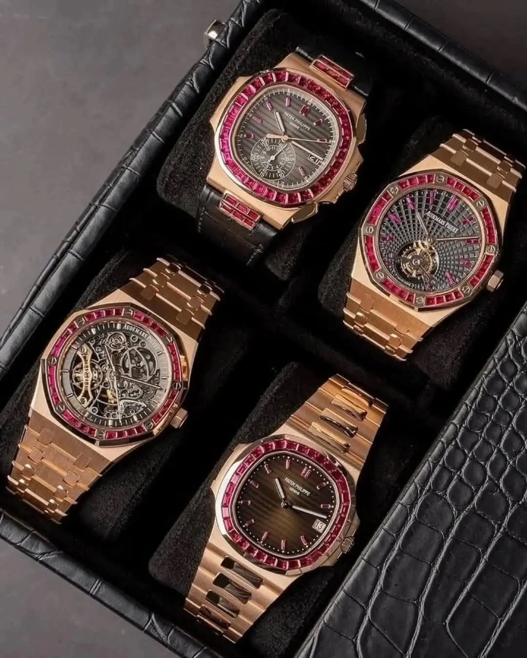 Four gem-set Patek Philippe and Audemars Piguet watches, including an openworked tourbillon, in a collector's travel case